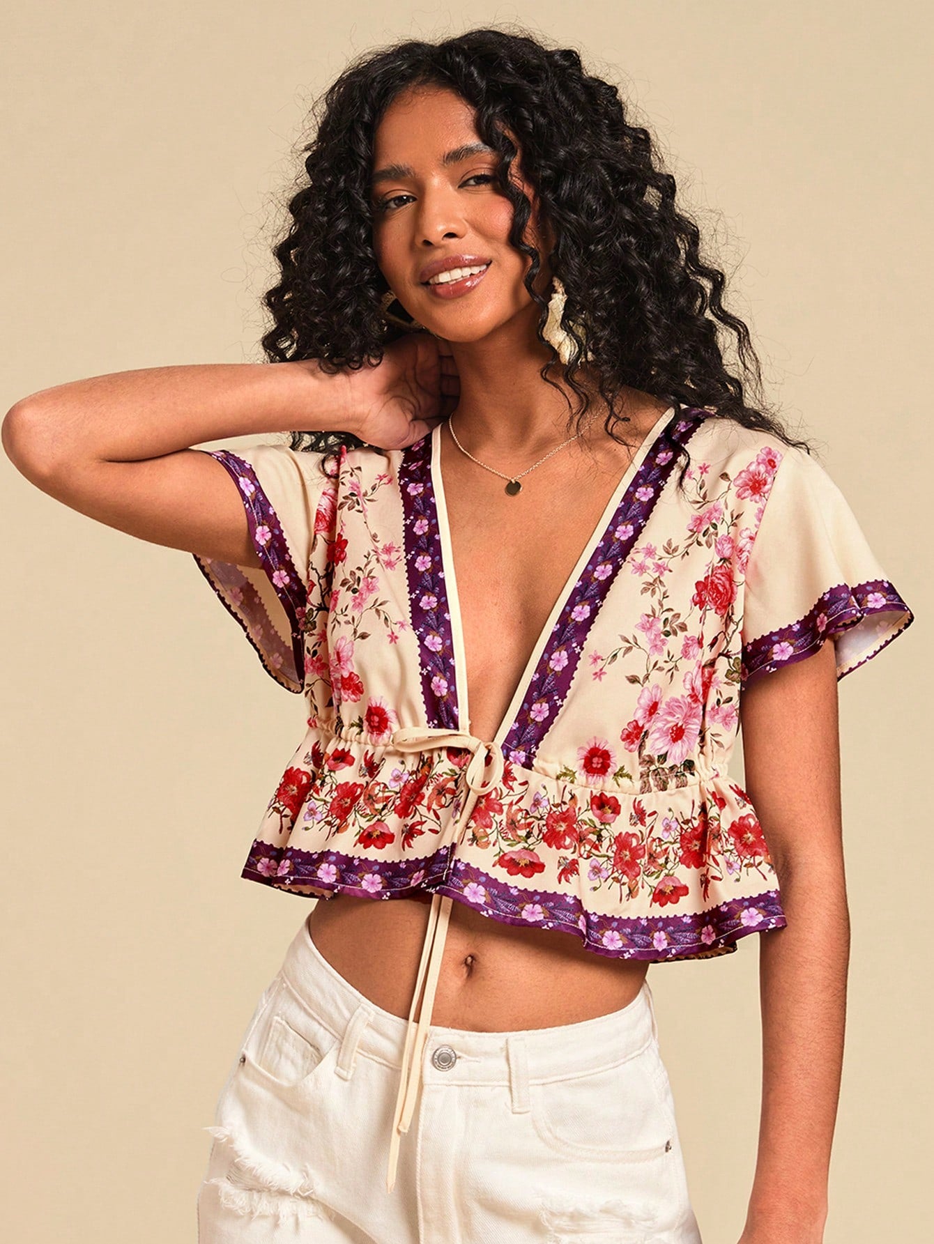 Wild Rosé Tie-Front Peplum Top.