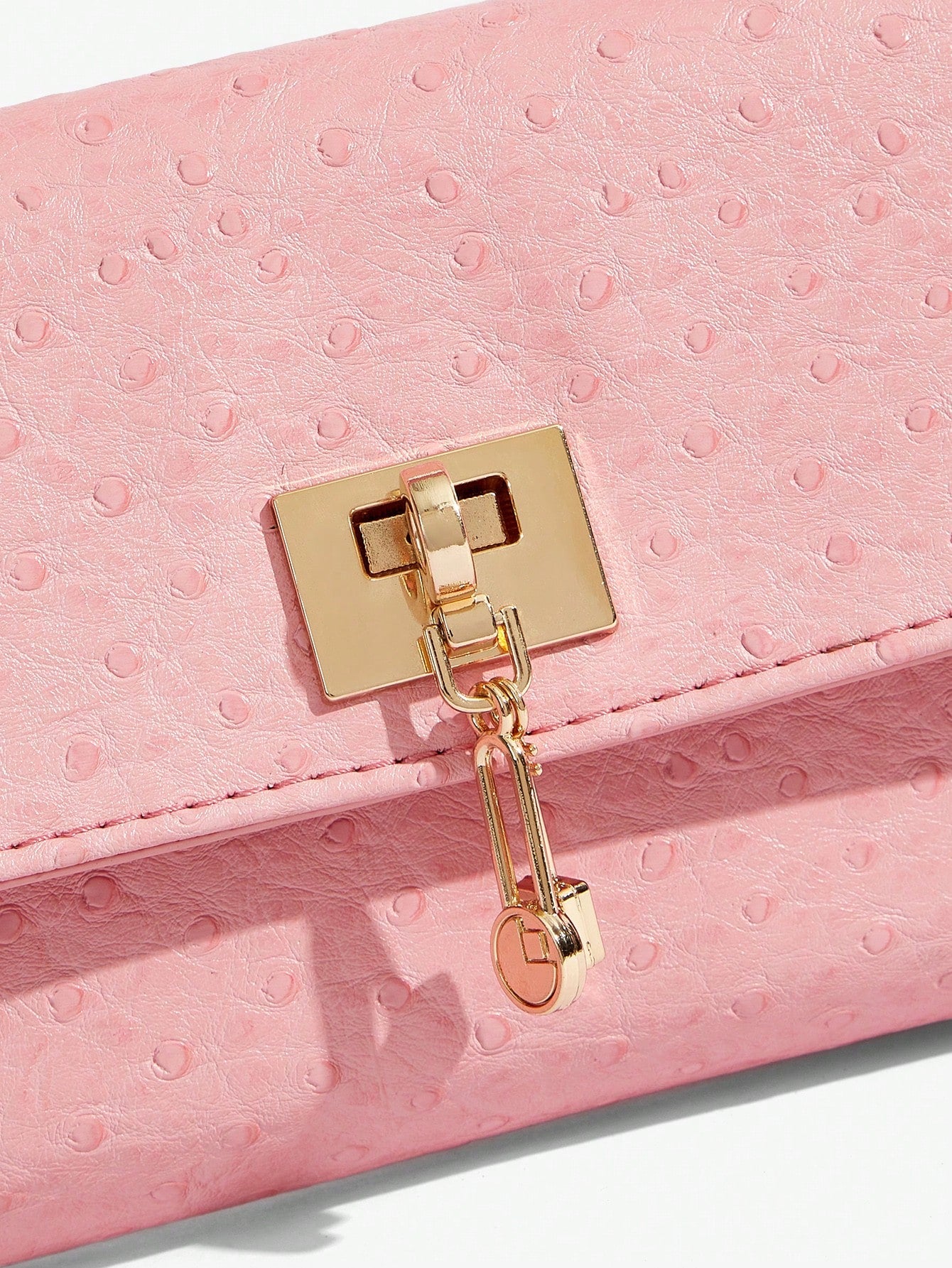 Blush Luxe Lock Clutch – Textured Pink.
